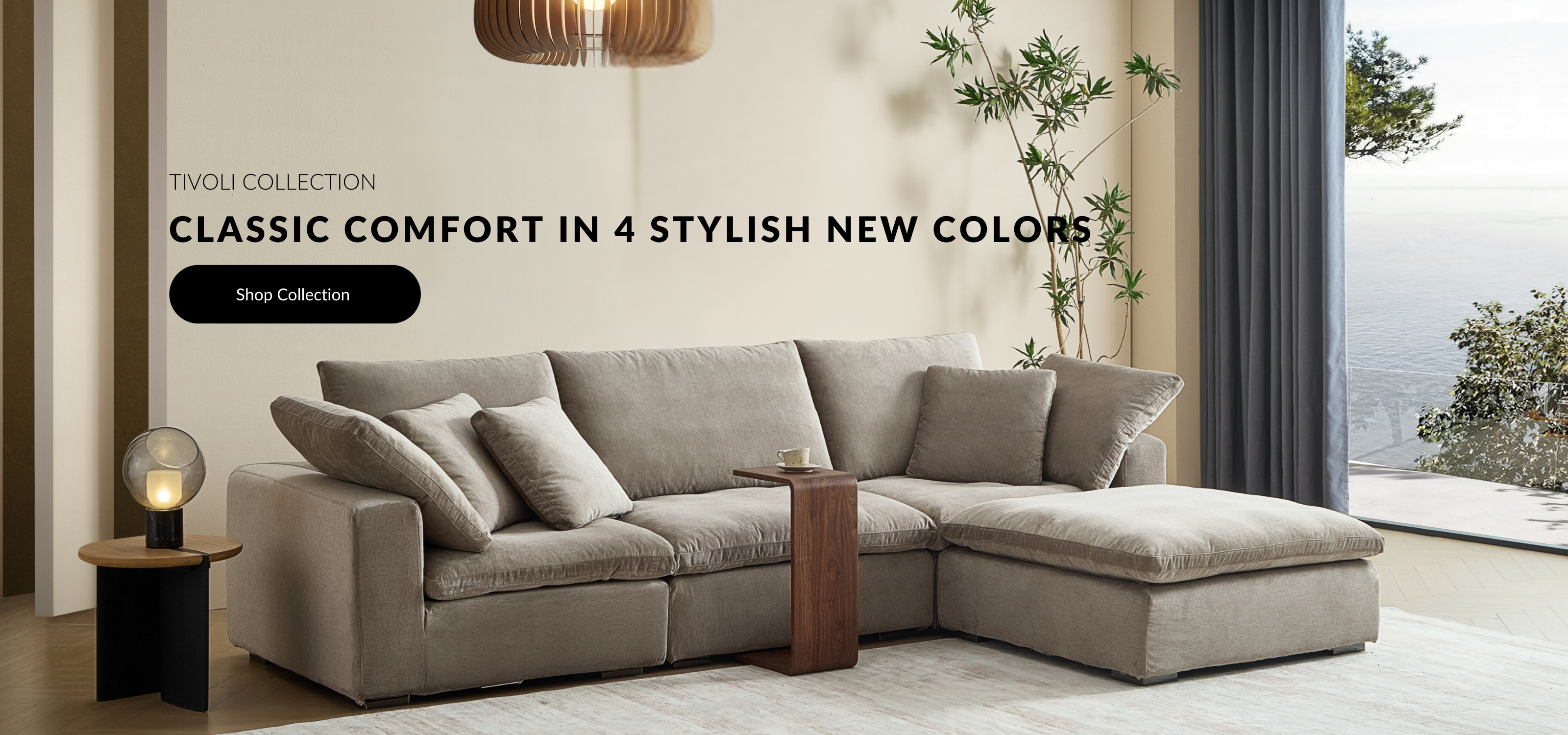 Mario Capasa web banner that shows the plush sand-colored cloud couch from the Tivoli sofa collection. Text on screen reads CLASSIC COMFORT IN 4 STYLISH NEW COLORS.