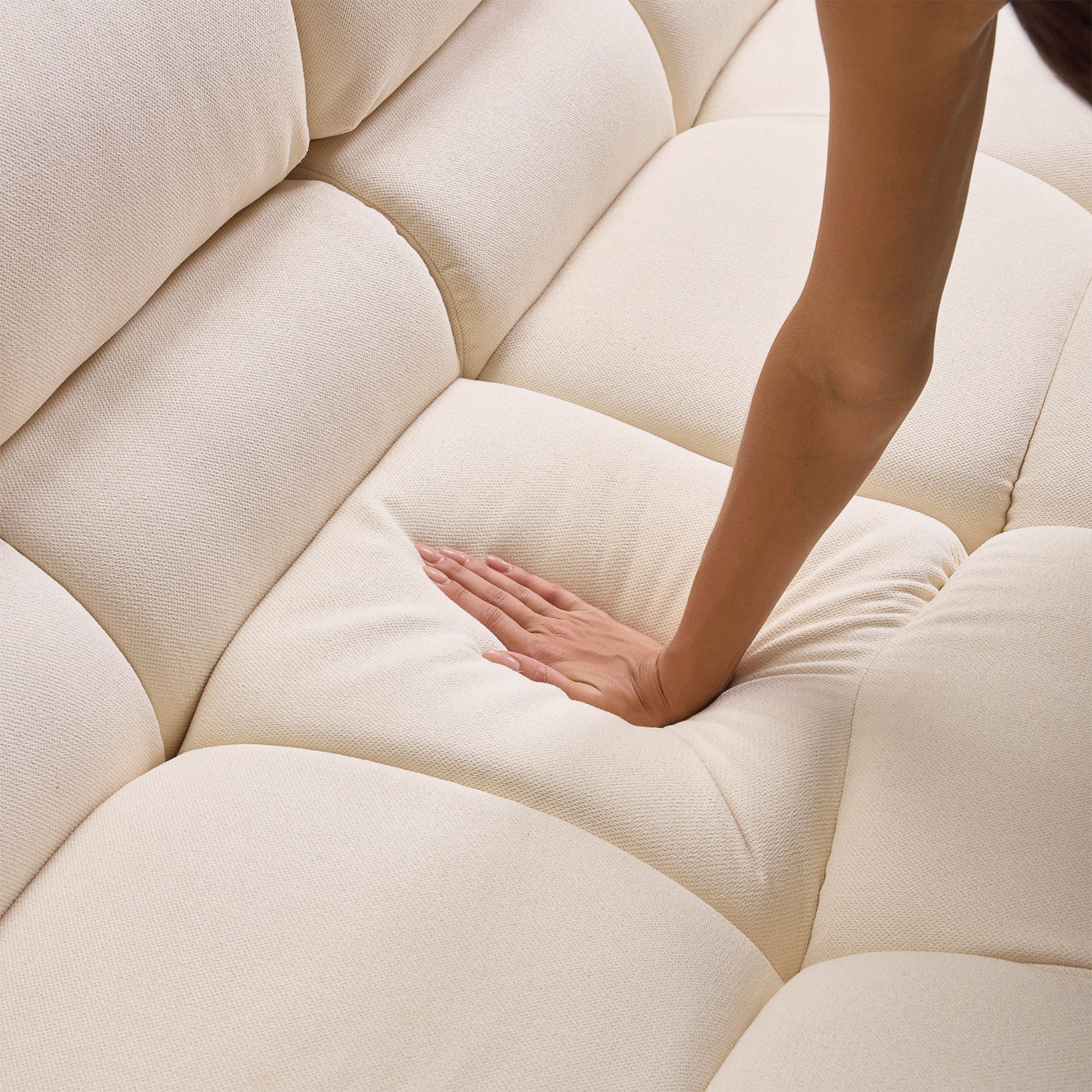 Amora sectional sofa in cream velvet finish presented as designer living room furniture.