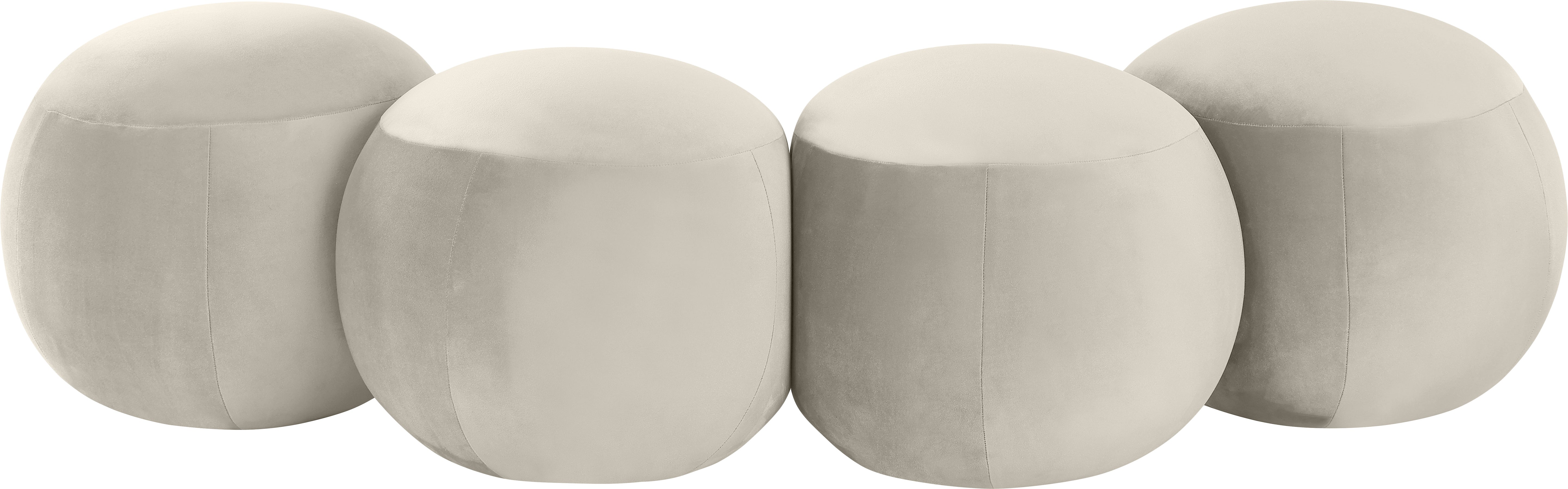 Four gray spherical cushions on a white background