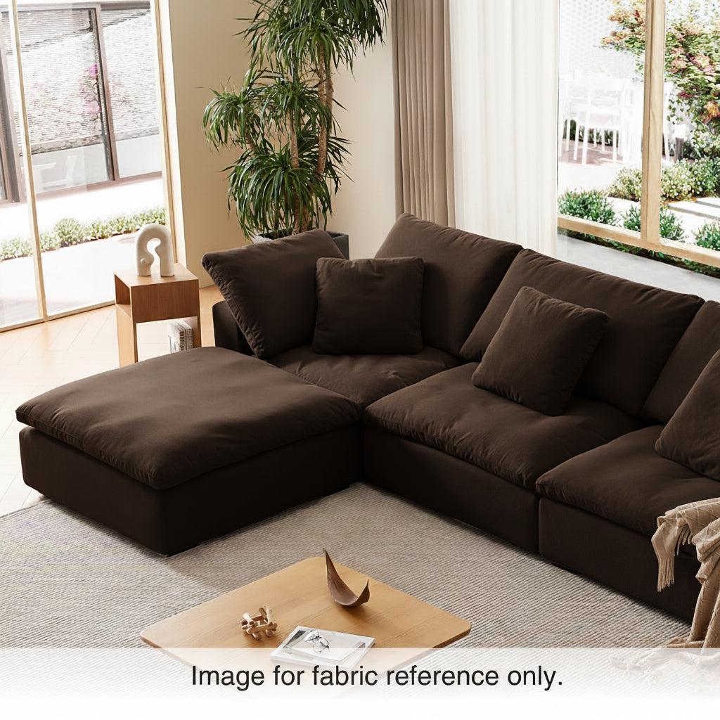 Brown velvet couch with rich dark fabric and plush texture, arranged in a contemporary living space from the Tivoli Velvet Sofa Collection by Mario Capasa.