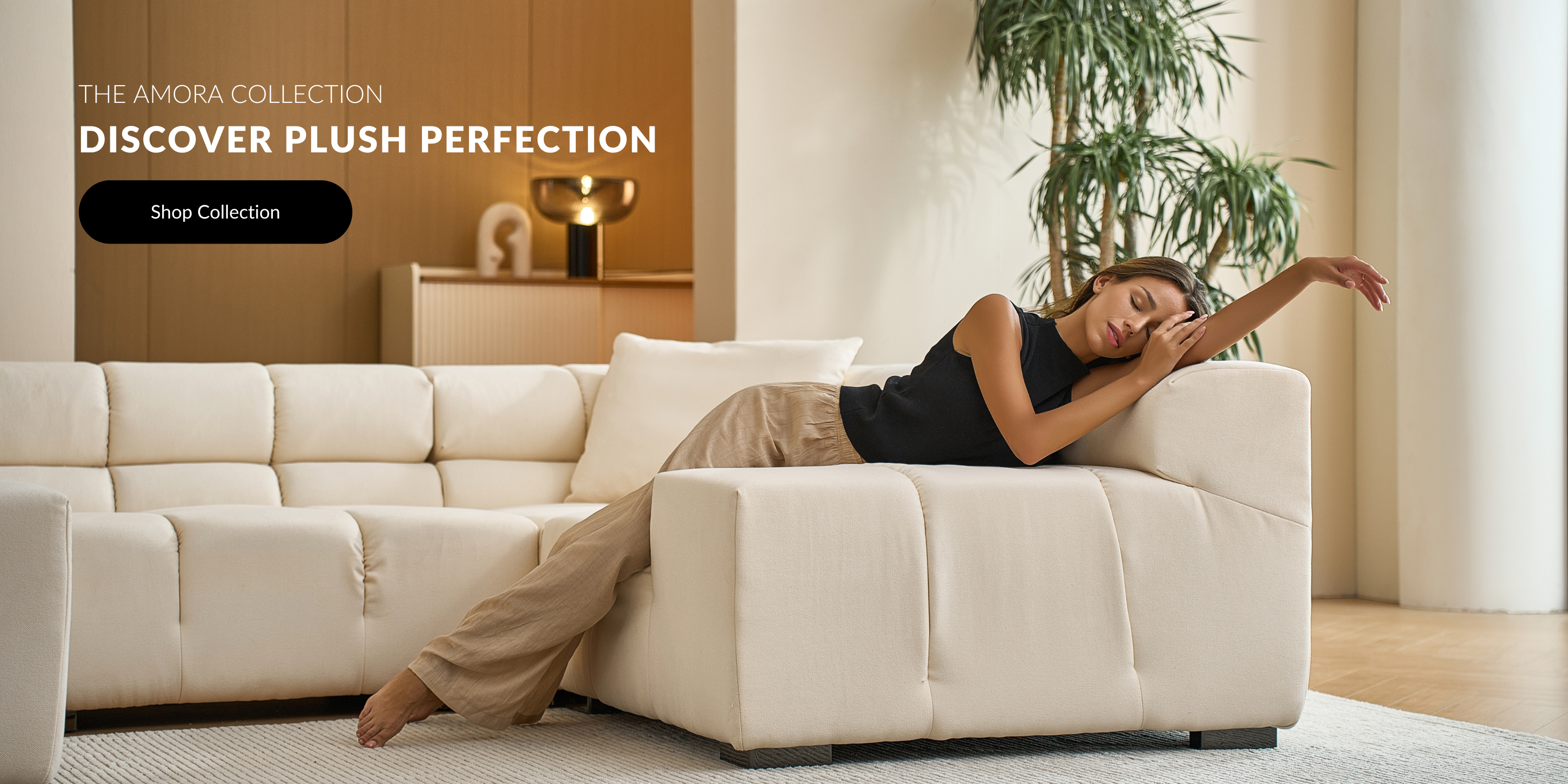 woman relaxing on a plush modular sectional with titles amora collection